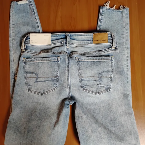 American Eagle Light Blue Ripped Jegging Super Stretch Jeans Size 0 25w - Picture 4 of 9